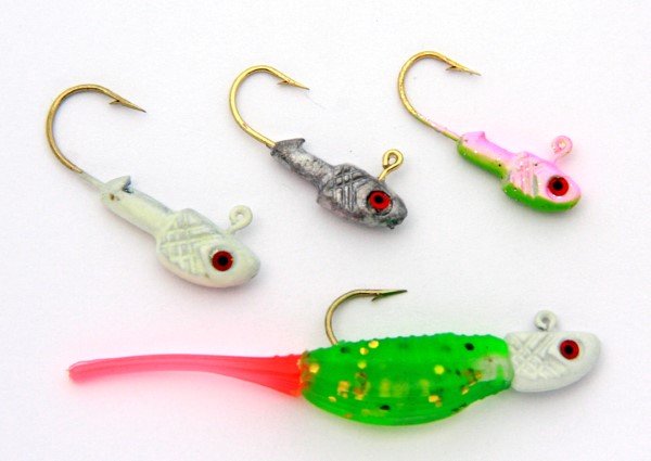 Jigging sometimes calls for a m innow/ shad imitator. A P anfish Assassin Pro Tiny Shad, with an assortment of jighead sizes, is a g ood example of a s had-style jig good for vertical presentations.