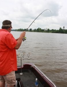 James Wesson pulls a crappie from Swift Creek on the Alabama River. Longline trolling is a great way to cover water and search an area with your electronics.