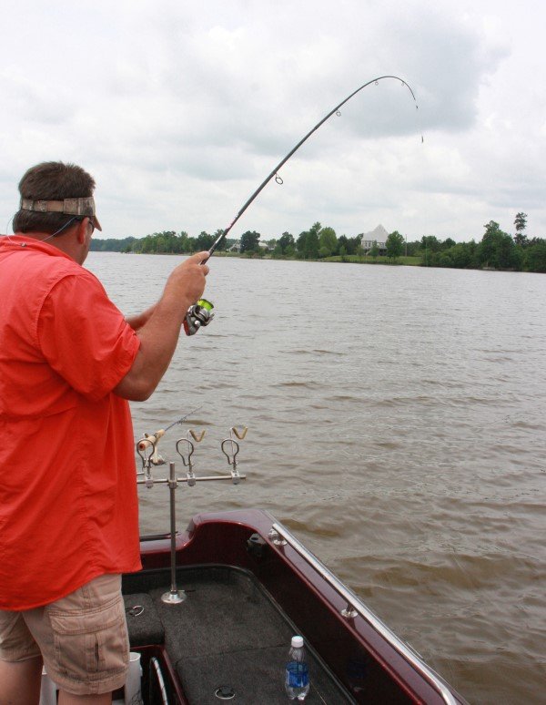 James Wesson pulls a crappie from Swift Creek on the Alabama River. Longline trolling is a great way to cover water and search an area with your electronics.