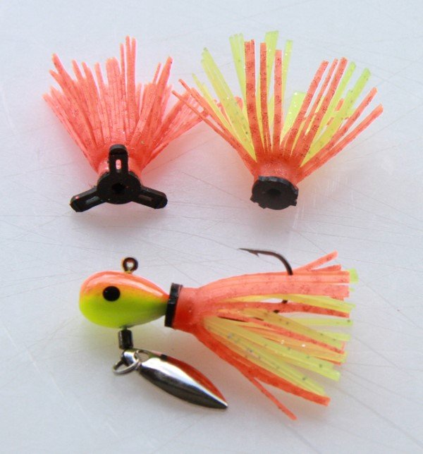 Bait Modification Smith likes the additional bulk and action offered by a Ziptailz skirt. He modifies the skirt by clipping off the three outer tabs on the rubber making it easier to get it on a jig and so they don’t interfere with the spinner action. The skirt offers a bigger profile and adds more color to a jig.