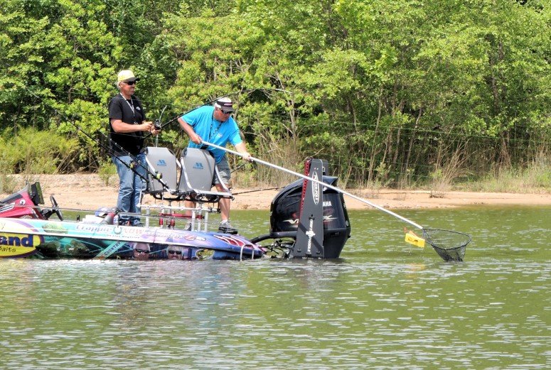 The rod rack on the back of the Crappie Country boat is designed to allow two anglers to work the planner boards and still leave room for netting the fish.