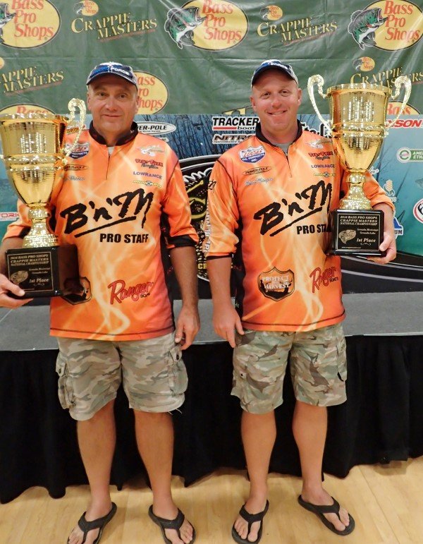 Watson and Matt Morgan holding the National Championship trophies earned in the 2016 Crappie Masters Championship at Grenada Lake, MS.