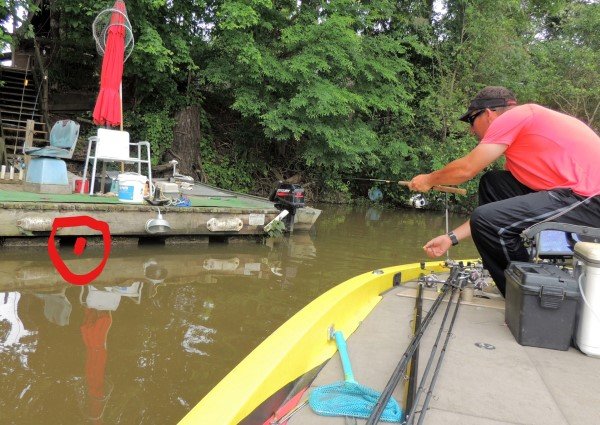 Williams likes to set his rod parallel to the water to consistently hit tiny targets on a dock he expects to hold crappie. Note the red circle and the size of the target he is shooting for.