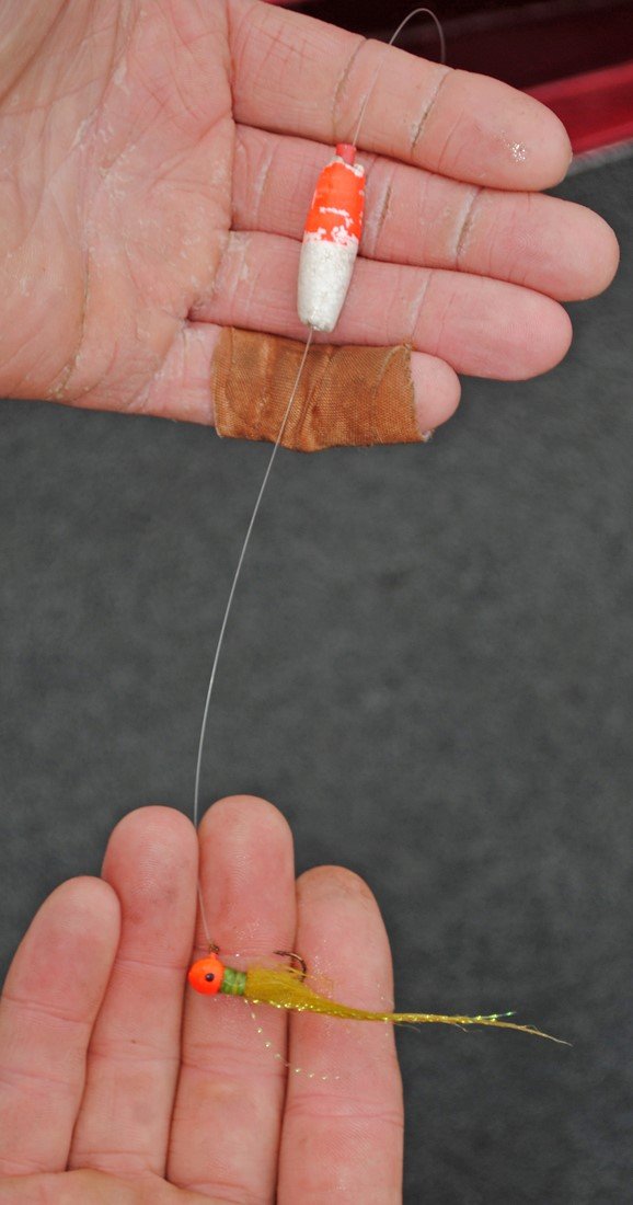 Steve Brown occasionally anchors down with hi Power Poles and casts to super shallow water. At times, the distance between the cork and jig is as little as 6 inches.