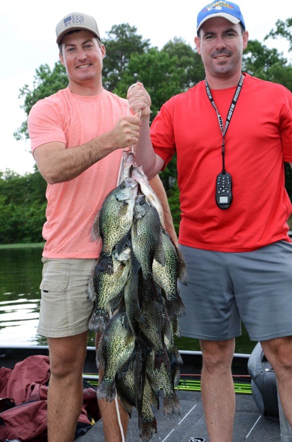 Here’s a fine catch of 1-2 pound crappie taken in an afternoon of fishing when the weather sizzled for Anthony Milner (left) and Jonathan Phillips (right).