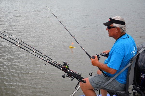 Dan Dannenmueller, from Wetumpka, Ala., works the trolling motor control while watching planer boards rigged with crankbaits.