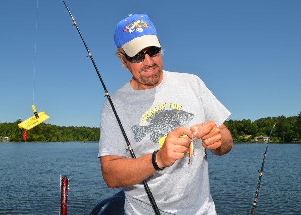 Proper preparation and setup is important. Garrett Steele rigs a crankbait for trolling with a planer board.