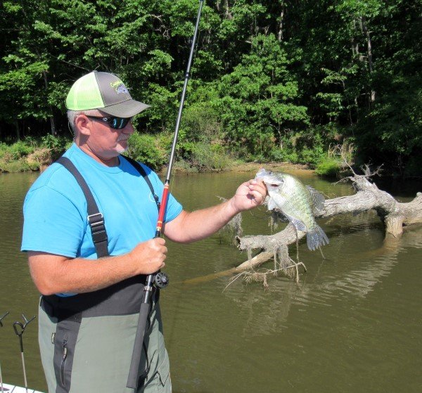 Crappie guide Gerald Overstreet with a crappie taken from cover in the Alabama River.