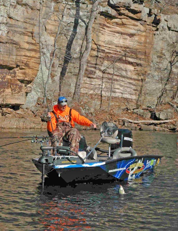 Former Crappie Masters National Champion Kyle Schoenherr goes deep to find crappie on the clear waters of Lake Kincaid during the fall turnover.
