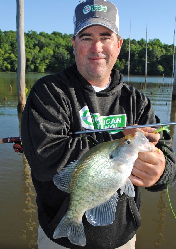 Mike Vallentine, president and owner of Crappie Masters, displays a crappie caught one-pole fishing on the Alabama River after a tournament there.