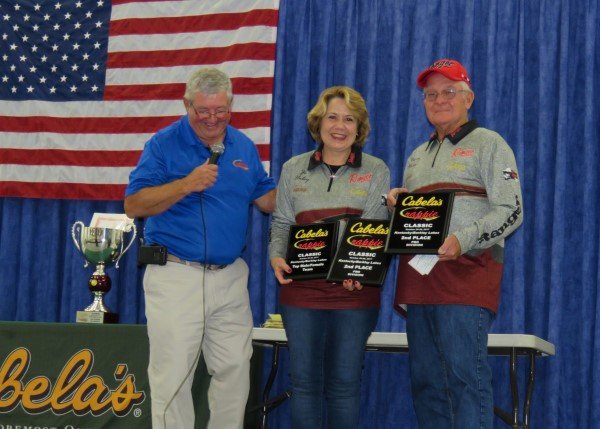 Henry and Jo Haley are shown here with Darrell Van Vactor as they receive their second place awards. They also won the Top Male/Female award and the Sportsman of the Year award.