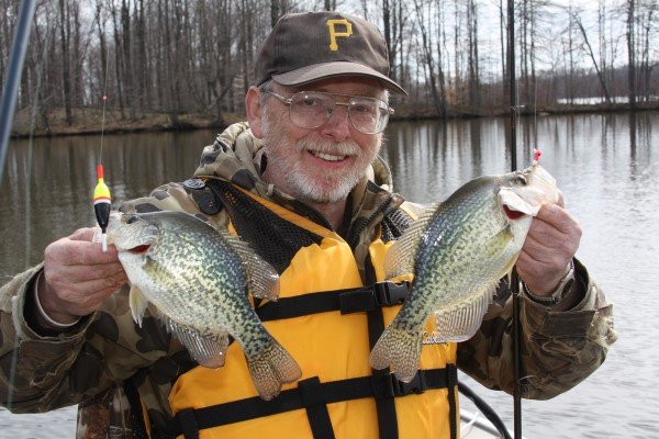 Jim McClave enjoys success on Pymatuning Lake for ice-out crappies holding in a shallow spatterdock pad bed using minnows below a float.