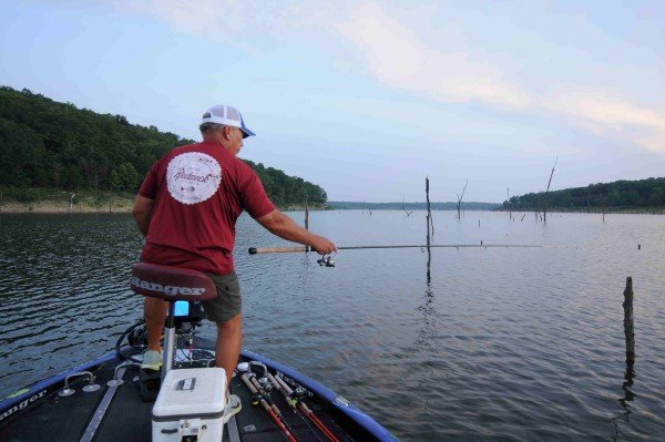Barry Morrow vertical jigs a drop shot rig when crappie are holding tight to the trunk of standing timber.