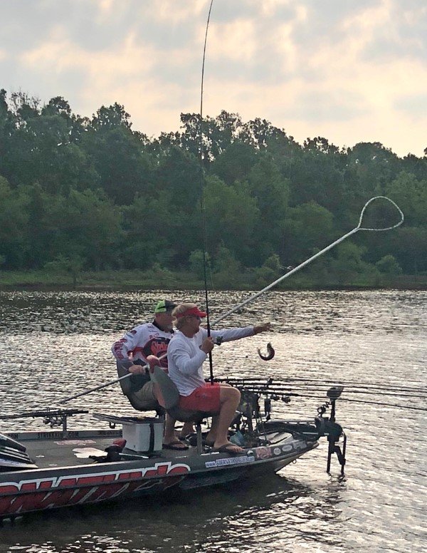 Tim Blackley and Paul Turner catching their fish in an oxbow.