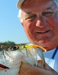 Dan Dannenmueller with a nice crappie caught on plastic tipped with a minnow. He says changing up sizes, colors and sometimes adding flash, can lead to more fish.