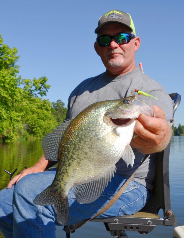 Gerald Overstreet shows off a crappie he caught on a feather jig while fishing on the Alabama River.